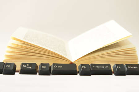Open Book and Computer Keysの写真素材