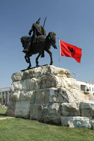 Tirana, Albania, Skanderbeg Monument and National Flagの写真素材