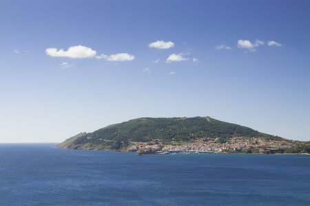 Spain, Galicia, Cape Finisterra seen from the last stretch of Camino de Fisterra