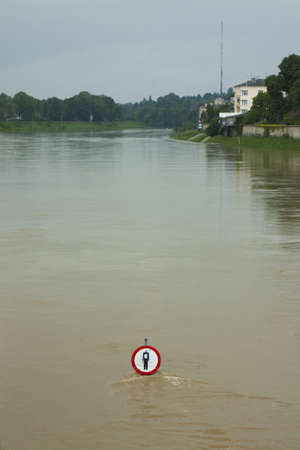 Polnad, KrakÃ³w, flooded Vistula/WisÅa river embankments, no entry sign over the waterの写真素材