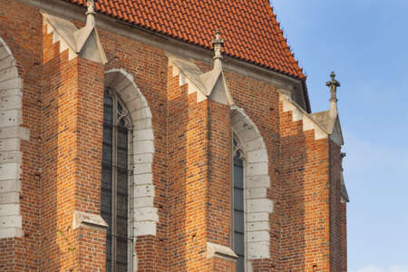 East end and tower of Corpus Christi Church, close up, Kazimierz district, Kraków, Poland, afternoon sunlightの写真素材