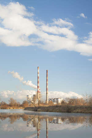 Cogeneration heat and power CHP plant in Krakow, Poland, sunlit, clouds on blue sky, autumnの写真素材