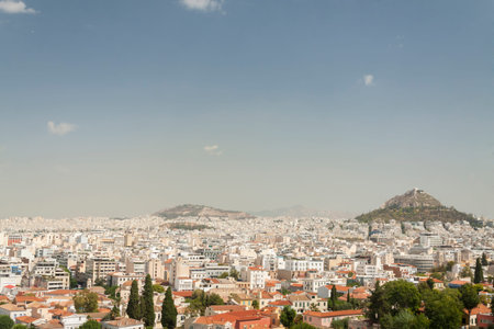 Greece, Athens, Panorama seen from Hill of Areopagus to the north, sunlit, mountain range in the...