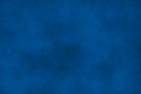 Dark painted surface in navy blue tones. Variety paint spots on wall. Mixed media backdropの写真素材