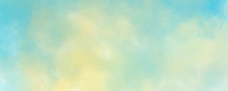 Pastel blue and yellow abstract cloudy sky watercolor background texture with soft spring colorsの写真素材
