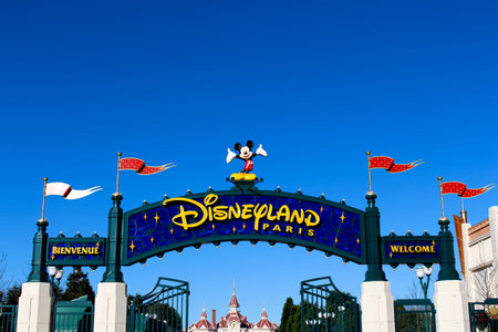 FRANCE - NOVEMBER 22, 2015: Disneyland amusement park entrance in Paris, France. Disneyland is the first entertainment group in the world in 2012.のeditorial素材