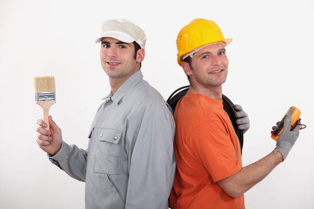painter and electrician posing together