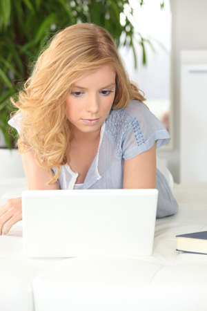Teenager browsing on the Internetの写真素材