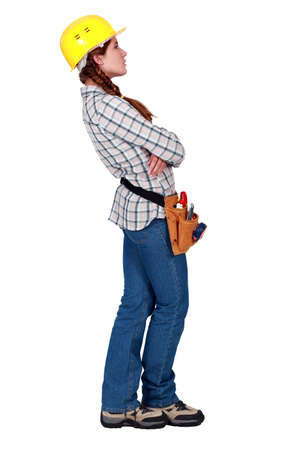 A female construction worker looking away.の写真素材