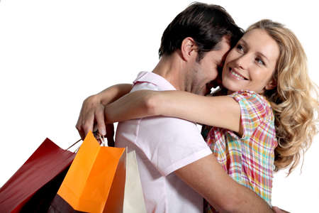 couple with shopping bagsの写真素材