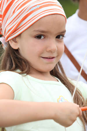 portrait of a little girl with bowの写真素材