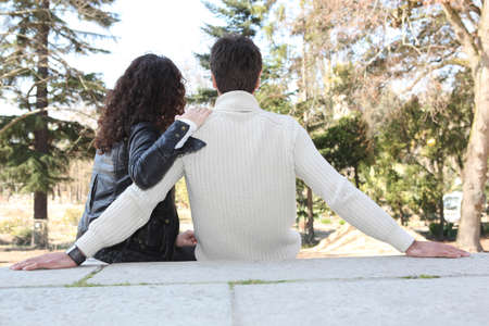 Couple in love sittingの写真素材