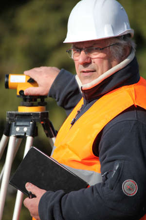 A mature foreman taking measure.の写真素材