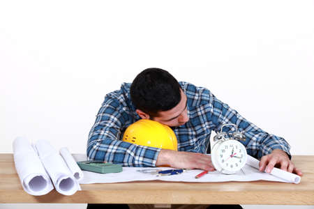Draughtsman sleeping on the jobの写真素材