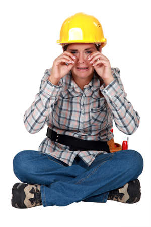 A sobbing tradeswomanの写真素材