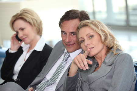 Business meeting in airportの写真素材