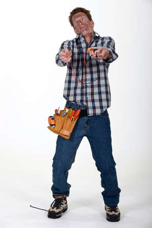 Man getting an electric shockの写真素材