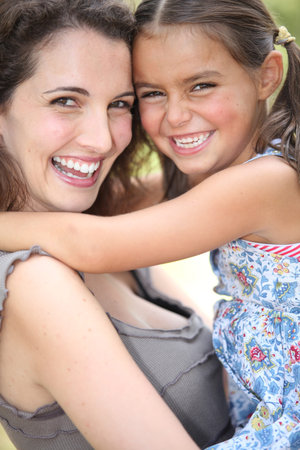 Mother and daughter in park