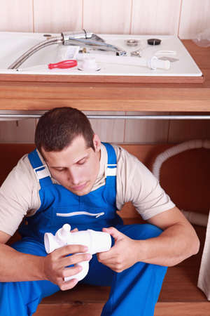 portrait of a young plumberの写真素材