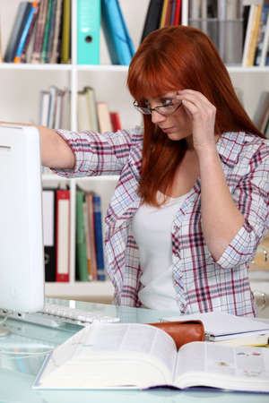 female student working on laptopの写真素材