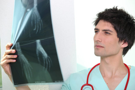 doctor examining a x-ray image