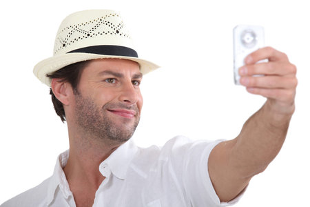 Man taking photo of himself