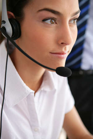 businesswoman wearing a headsetの写真素材