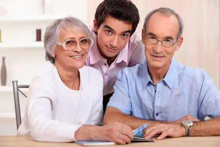 Grandson posing with his grandparents