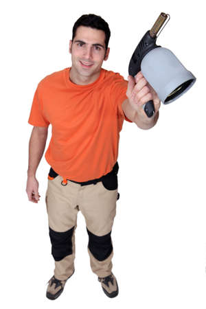Man holding blow torchの写真素材