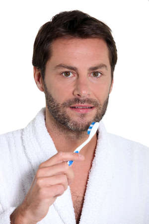 man with toothbrushの写真素材