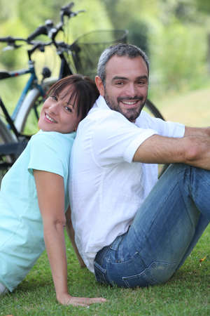 Couple having a bike ride in the countryの写真素材