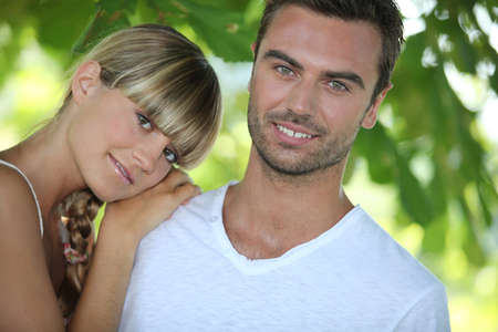 couple relaxing in the parkの写真素材