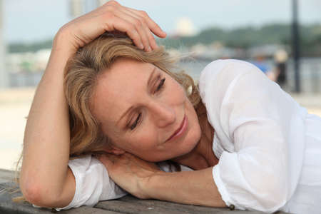 Woman resting outsideの写真素材