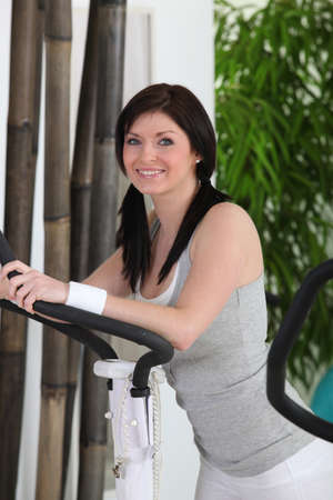 brunette woman doing fitnessの写真素材