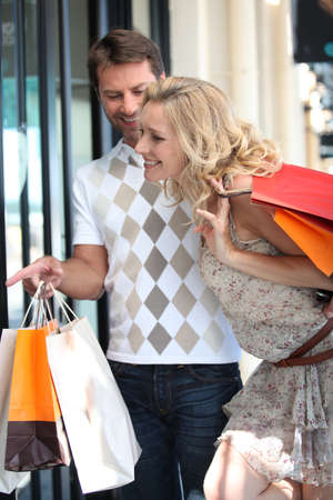 Couple go on a shopping spreeの写真素材