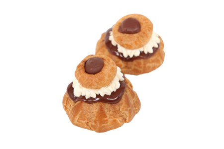 Cream puffs isolated on white background