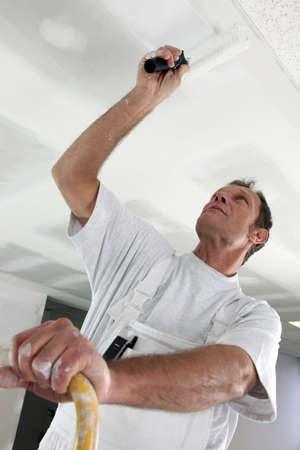 Painter in room under constructionの写真素材