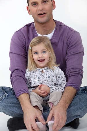 loving father and cute blonde daughterの写真素材