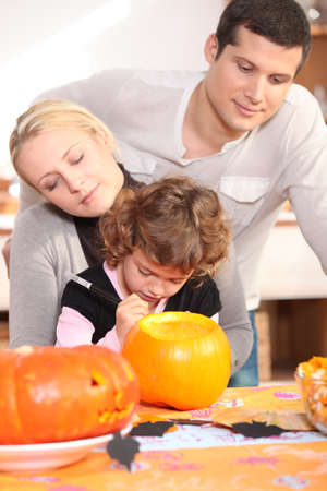 Family carving pumpkinの写真素材