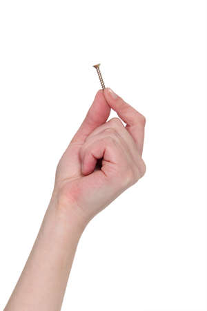 Hand holding a screwの写真素材