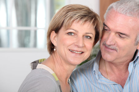 Middle-aged couple at home