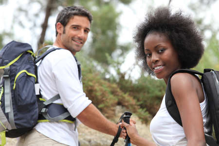 Man smiling next to the river.の写真素材