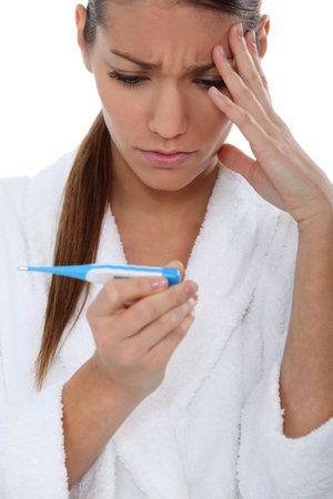 Young brunette with pregnancy test