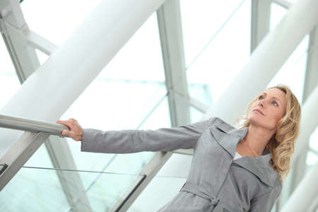 Businesswoman looking out of the windowの写真素材