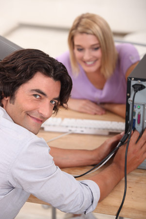 technician repairing computer