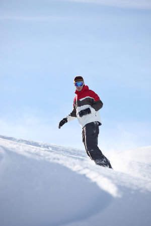 Man snowboarding aloneの写真素材