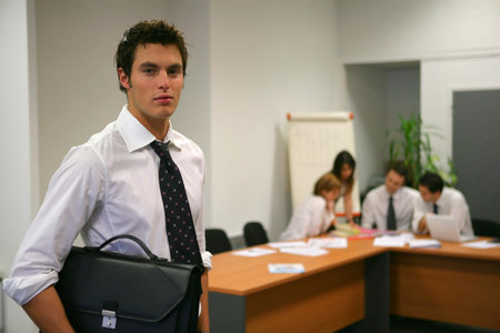 Man arriving at business meeting