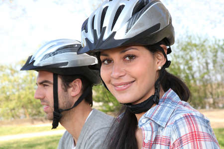 a couple doing mountain bikeの写真素材