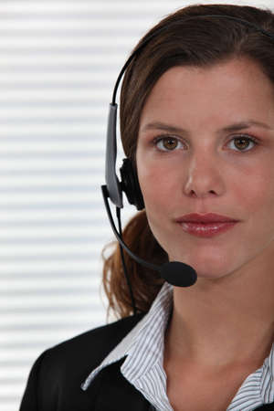 Close-up shot of woman wearing headphonesの写真素材