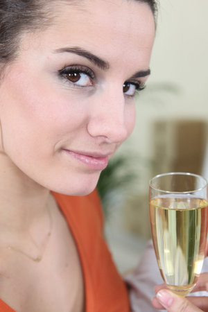 Woman drinking champagne